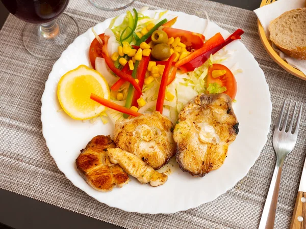 Appetizing Fried Cod Steaks Served Fresh Lemon Slice Vegetable Salad — Stock Photo, Image