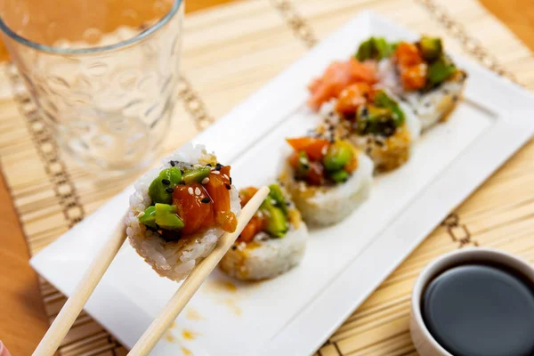 Plate Delicious Sake Maki Rolls Salmon Pieces Avocado Crab Cucumbers — Stock Photo, Image