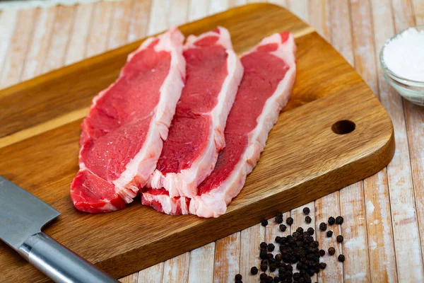 Ingredients Cooking Raw Beef Entrecotes Peppercorn Wooden Surface — Stock Photo, Image