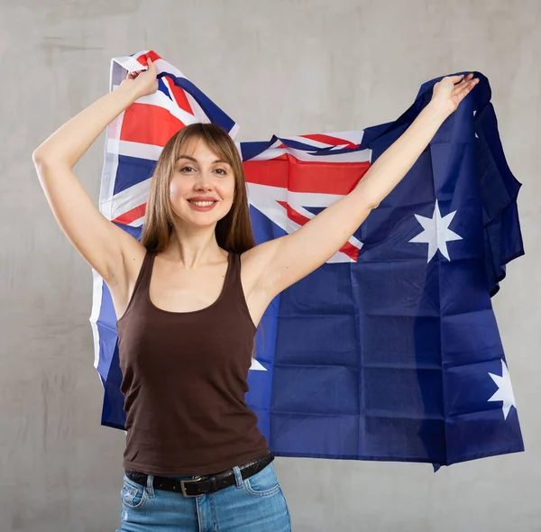 Happy Young Woman Large Flag Australia Posing Gladly Light Unicoloured — Stock Photo, Image