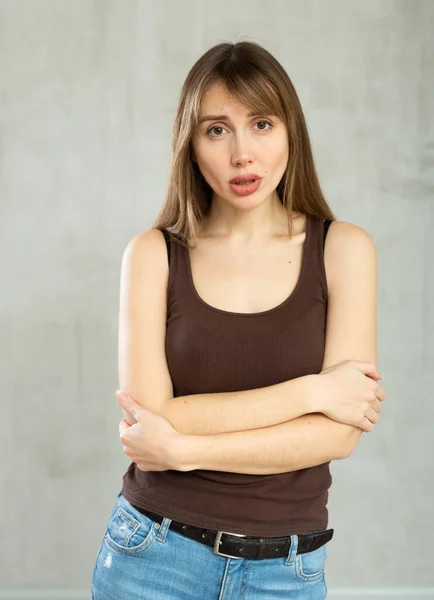 Upset Young Woman Casual Clothes Posing Studio — Stock Photo, Image