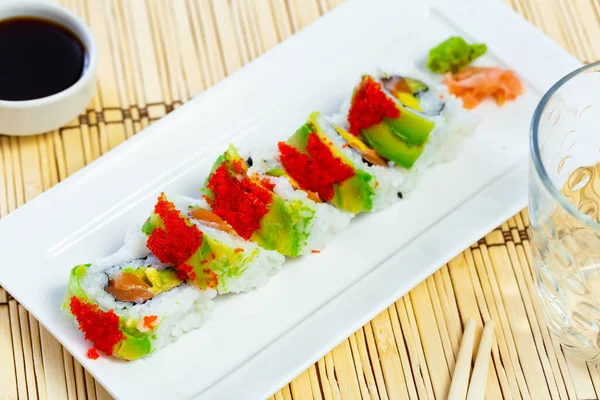 Sushi Roll Uramaki Salmon Mango Avocado Cucumber Served Red Tobiko — Stock Photo, Image