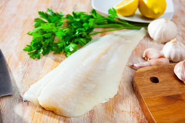 Image Fillet Raw Cod Fillet Cooking Wooden Background Garlic Greens — Stock Photo, Image