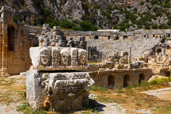 Carved stone faces in theatre of Myra, ancient Lycian city in Demre, Antalya Province, Turkey.
