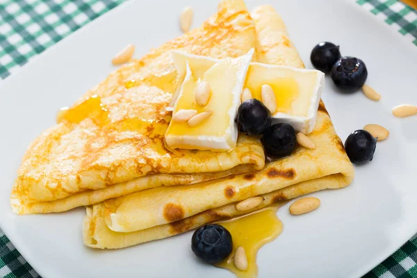 Delicate Thin Pancakes Brie Slices Honey Toasted Pine Nuts Garnished — Zdjęcie stockowe
