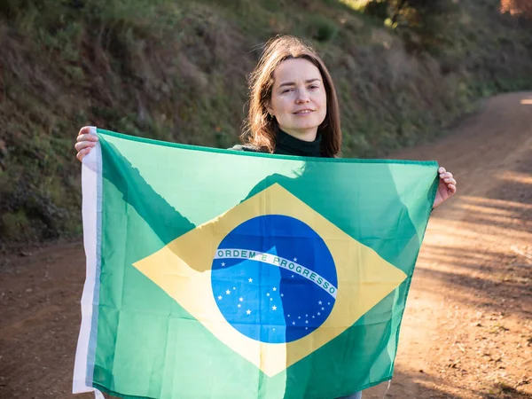 Smiling Middle Aged Woman Holding Large Flag Brazil Background Ground — Stock Photo, Image