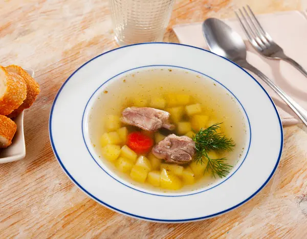 Hearty Homemade Soup Pork Meat Bone Vegetables Served Greens — Stock Photo, Image