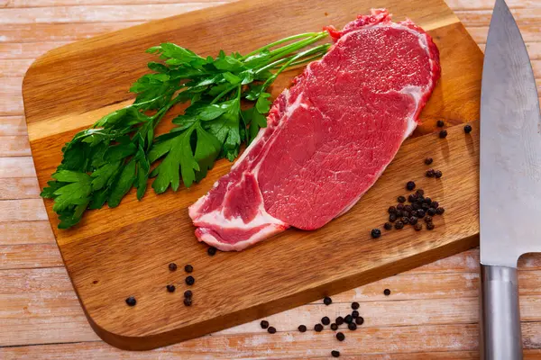 Raw Piece Beef Tenderloin Spices Wooden Cutting Board Light Background — Stock Photo, Image