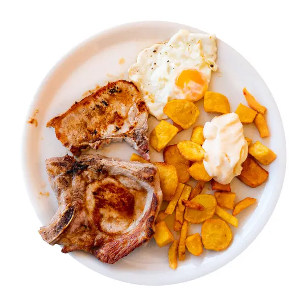 Аппетитная Свиная Отбивная Подается Блюдечке Картошкой Яйцами Изолированный Белом Фоне — стоковое фото