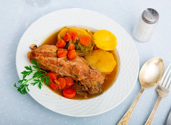 Delicious Dish Stewed Pork Ribs Potatoes Vegetables Decorated Fresh Sprig — Stock Photo, Image