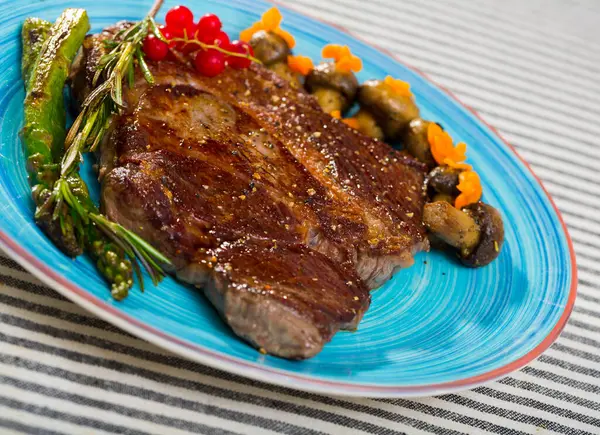 Roasted Veal Steak Seasonings Served Baked Vegetables Rosemary Striped Textile — Stock Photo, Image