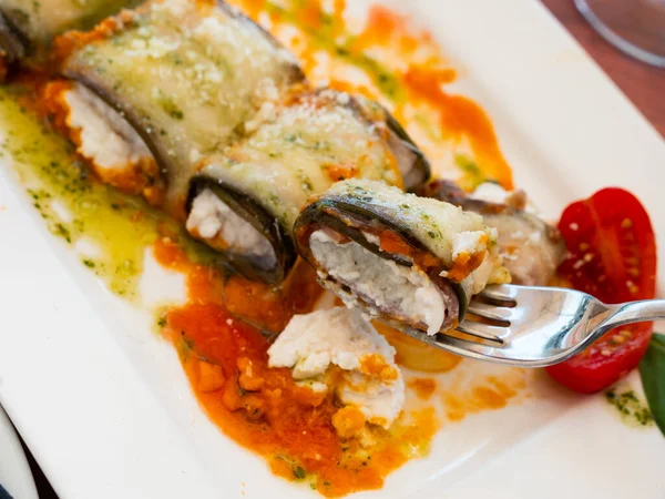 Delicious eggplant stuffed with vegetables served on plate