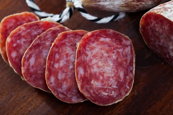 Traditional Catalan Dry Cured Pork Sausage Longaniza Sliced Pieces Wooden — Stock Photo, Image