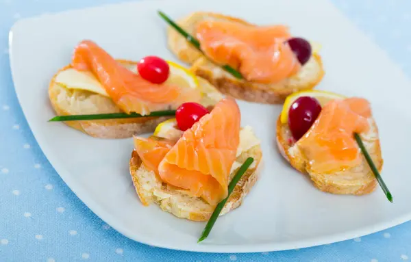 Delicious Sandwiches Smoked Salmon Butter Lemon Cranberries White Plate — Stock Photo, Image