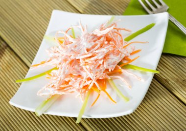 Lacto-vegetarian dish. Spicy salad of grated carrots with garlic and fresh sour cream..