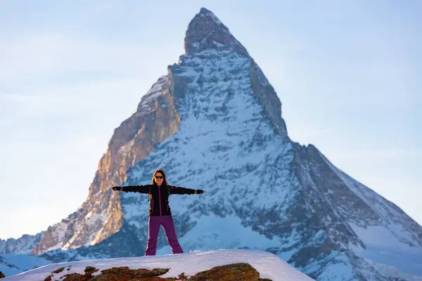 Full Length Portrait Cheerful Female Hiker Posing Snow Covered Stone — Stock Photo, Image
