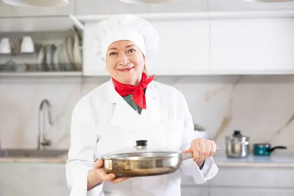 Spacious Bright Kitchen Elderly Female Kitchen Manager Holds Frying Pan — Stock Photo, Image