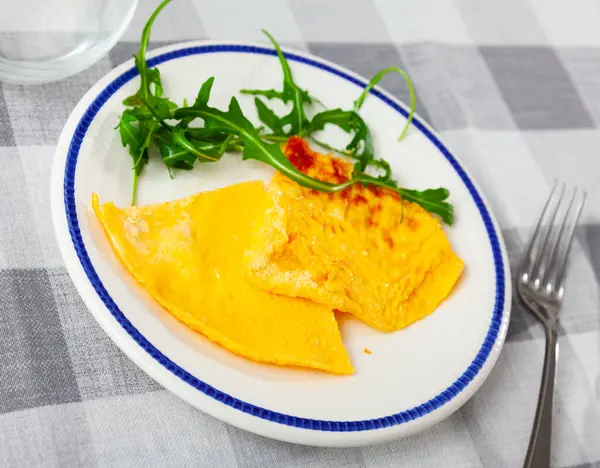 Freshly Made Omelet Plate Two Pieces Fried Omelet Decorated Arugula — Stock Photo, Image