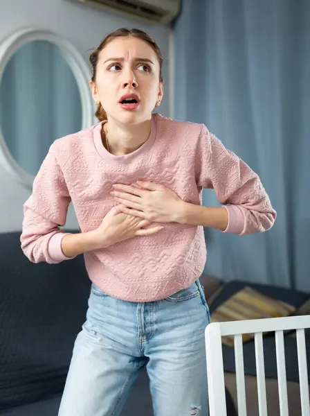 Young Woman Touching Her Chest Feeling Pain Apartment — Stock Photo, Image