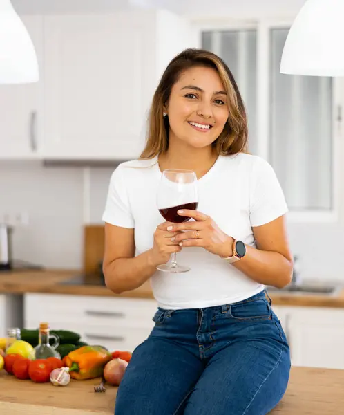 Cheerful Carefree Young Hispanic Woman Relaxing Work Home Sitting Table Royalty Free Stock Photos
