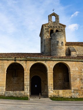 Valdenoceda Catholic Church in Gothic style, built of light limestone near Villavicios, Asturias, Spain. Ancient medieval building, religious house clipart