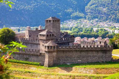 Medieval castle of Montebello on sunny summer day. Bellinzona. Switzerland clipart