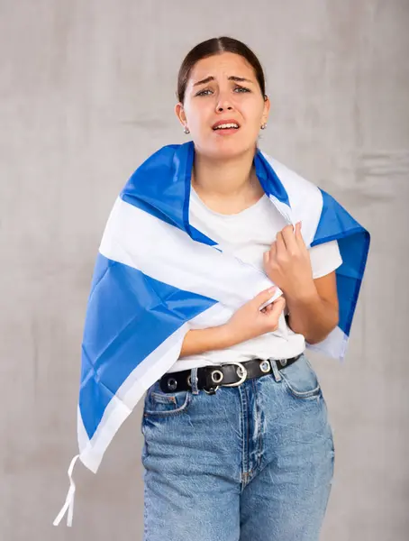 Sad Young Woman Scotland Flag Shoulders Posing Sorrowfully Light Unicoloured — Stock Photo, Image