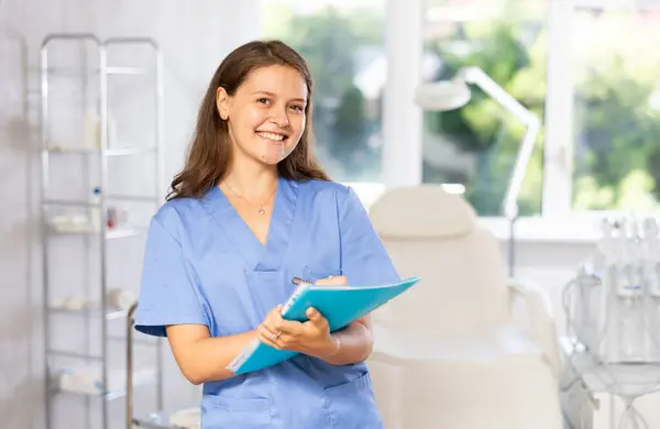 Young Female Doctor Medical Uniform Taking Notes Agreement Medical Office Royalty Free Stock Images