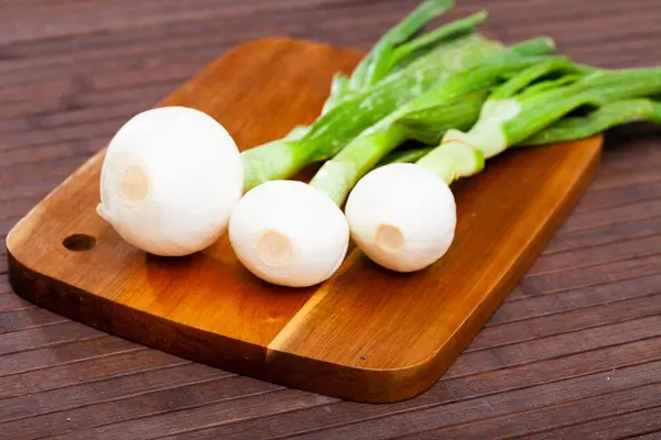 Whole Green Young Onion Bulbs Wooden Desk Cooking Stock Photo