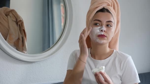Young Pleased Woman Making Cleansing Nourishing Face Mask Home Morning — Stock Video