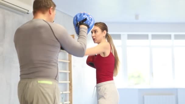 Active Young Woman Middle Aged Man Applying Kicks Hitting Mitts — Stockvideo