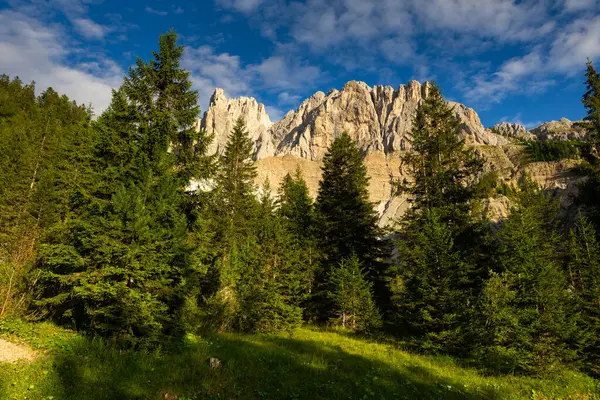 stock image Hiking through Dolomite Mountains is surreal experience, surrounded by jagged peaks and serene landscapes.