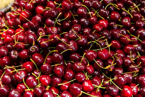 stock image Food background, ripe sweet red cherries on counter