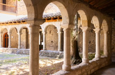 Monastery of Sant Llorenc de Morunys. Cloister of the monastery church. Catalonia, Spain clipart