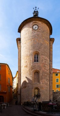 View of ancient tower Tour des Templiers or Saint Blaise chapel in small French town of Hyeres on sunny autumn day. clipart