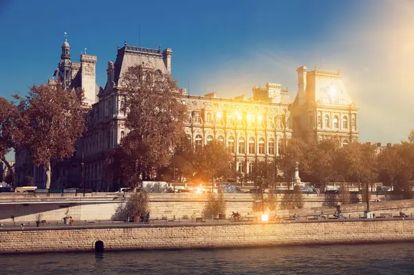 stock image View of impressive architecture of Paris City Hall on bank of Seine river on sunny autumn day, France