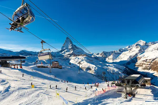 stock image ZERMATT, SWITZERLAND - JANUARY 1, 2022: Mountain landscape with view of Matterhorn. Ski resort in Zermatt, Switzerland.