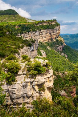 Scenic view of cliffs at Tavertet municipality in Catalonia near Barcelona, Spain clipart