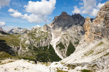 Hiking through Dolomite Mountains is surreal experience, surrounded by jagged peaks and serene landscapes. clipart