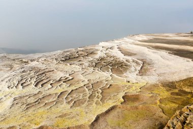 The travertines mountains of Pamukkale, located in the South-West of Turkey. clipart