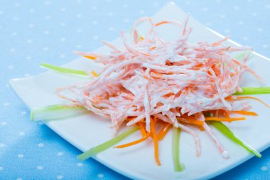 Vitamin salad with fresh julienne carrots, garlic and sour cream.. clipart