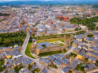 Panoramic view of Spanish town of Ponferrada with Castillo de los Templarios castle clipart