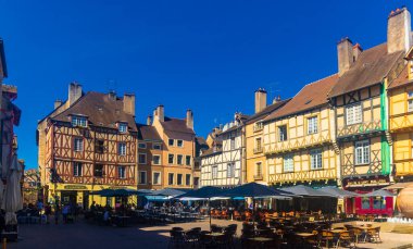 CHALON-SUR-SAONE, FRANCE - August 02, 2022: Traditional houses and outdoor cafes in streets of old town Chalon-sur-Saone, France clipart