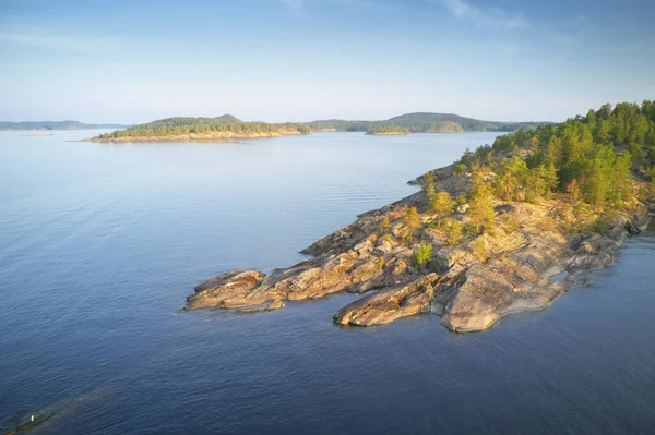 stock image Island on lake during sunset, aerial view. Nature landscape composition.