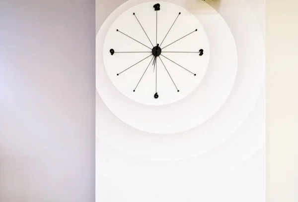 Clock on wall. Minimalism style design.