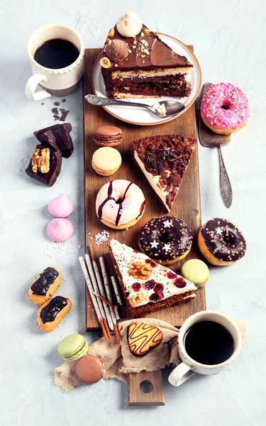 Selection Various Cake Pieces Macaroons Meringues Cookies Donuts Wooden Desk — Stock Photo, Image