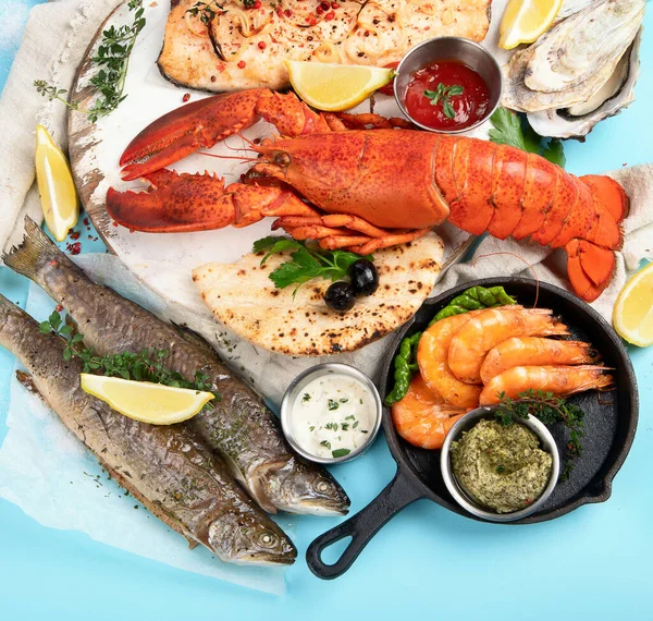 Various Seafood Fishes Dishes Healthy Food Concept Blue Background Top — Stock Photo, Image