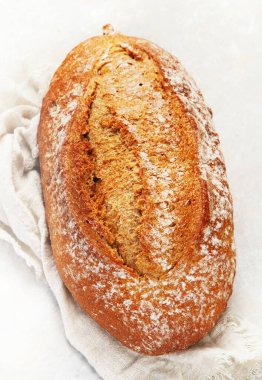Bread assortment on neutral background. Fresh homemade pastry. Top view
