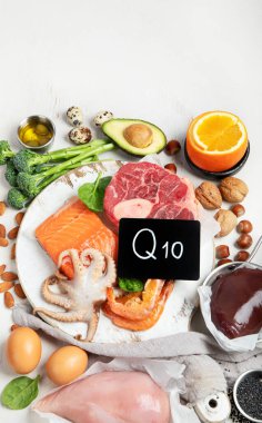 Composition with food contains coenzyme Q10, antioxidant, produce energy to cell, products against free radicals, and supports body as it ages, immune system, keeping body strong and healthy. Top view