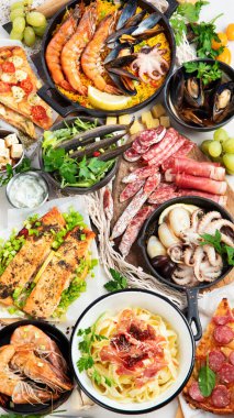 Assortment various Mediterranean food - fish, octopus, shrimp,  seafood, mussels, sauces, pasta, pizza on a white background. Top view.